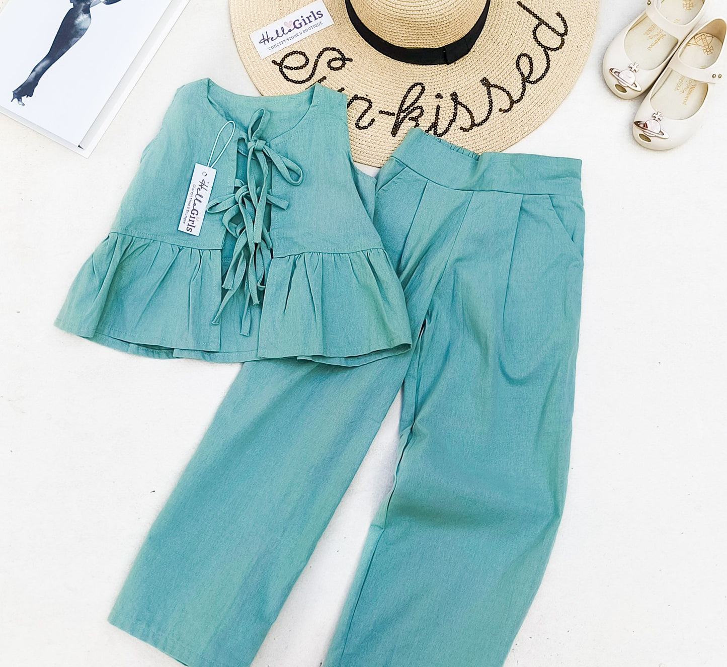 Sleeveless Top with Ruffle Detail Pants