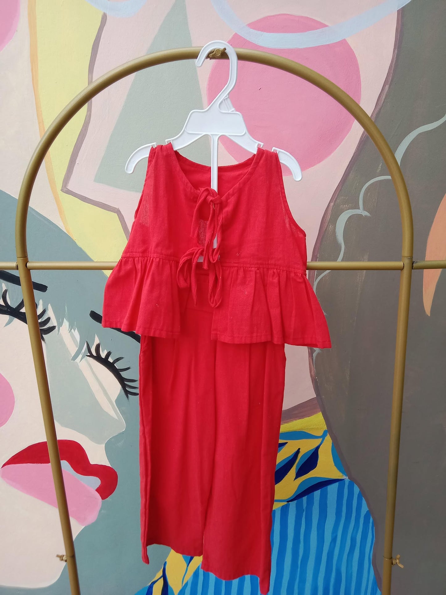 Sleeveless Top with Ruffle Detail Pants