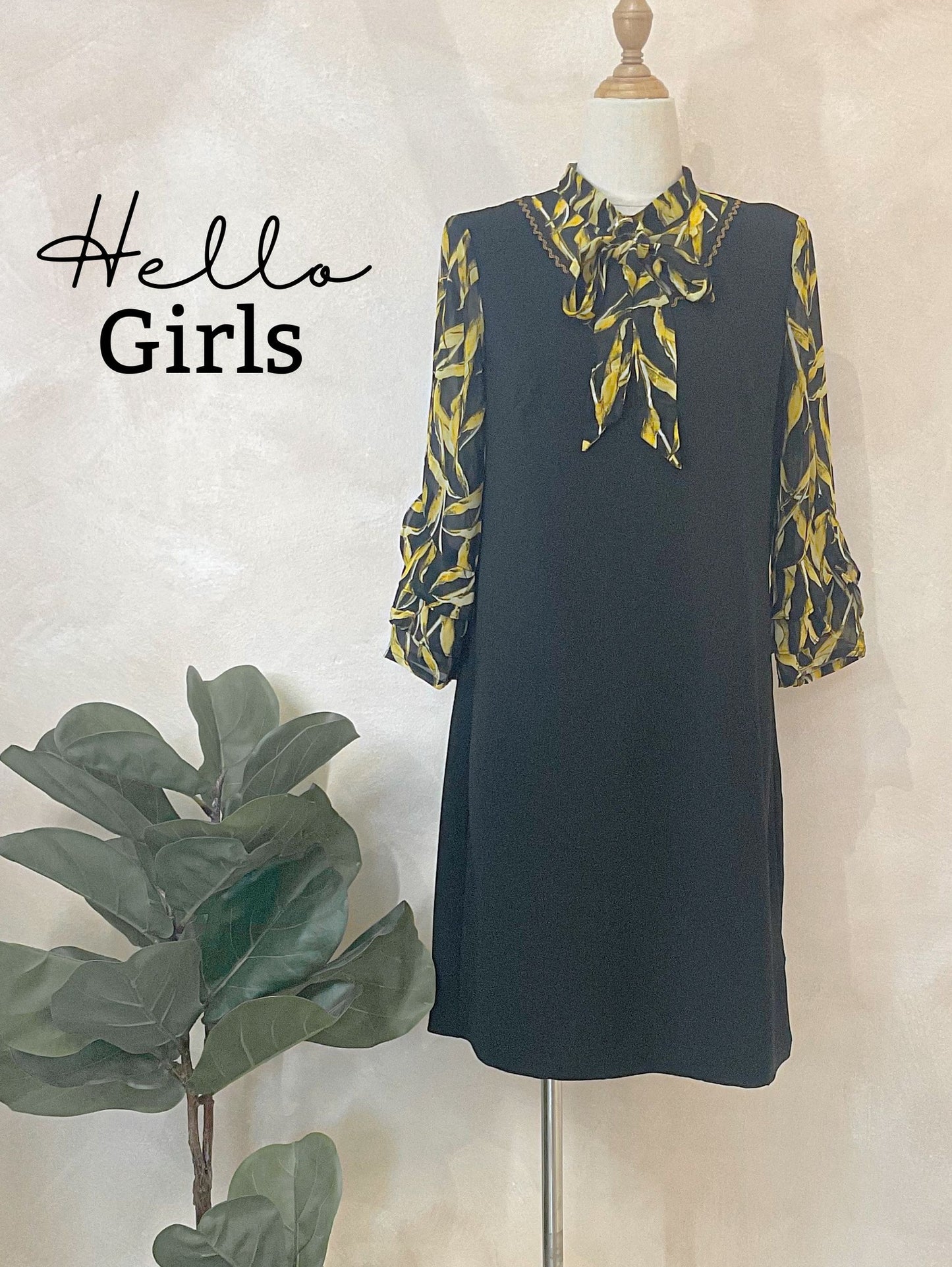 Elegant Black Shift Dress with Printed Sleeves and Bow Tie Neck